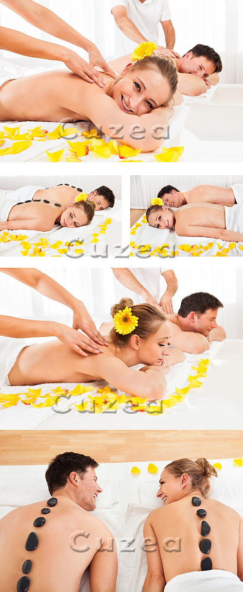      / Woman and man in the spa salon with yellow petals