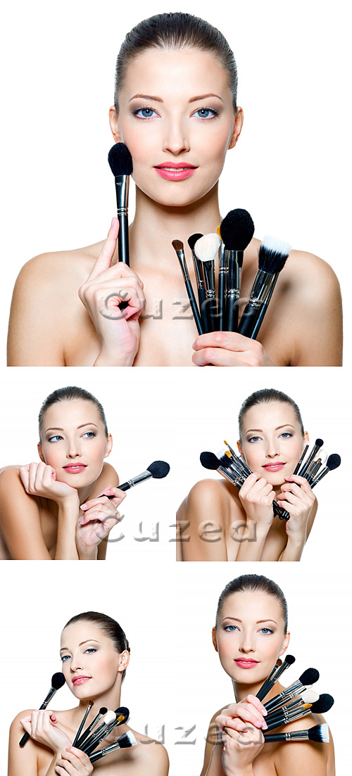      / Beautiful young woman holding make-up - stock photo